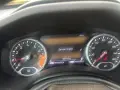Cruscotto Jeep Renegade con spia motore accesa e messaggio "Service Engine". Chilometraggio 94718 miglia.