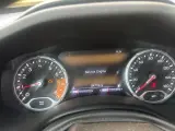 Cruscotto Jeep Renegade con spia motore accesa e messaggio "Service Engine". Chilometraggio 94718 miglia.