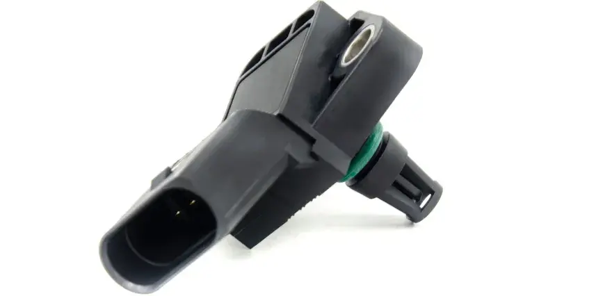 Sensore pressione turbo guasto, componente nero in plastica con connettore e anello verde.