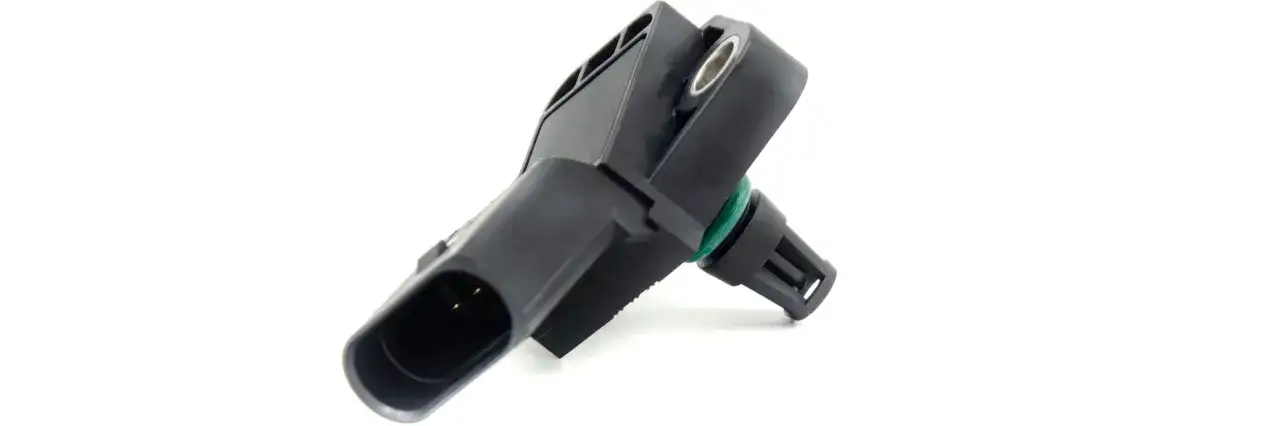 Sensore pressione turbo guasto, componente nero in plastica con connettore e anello verde.